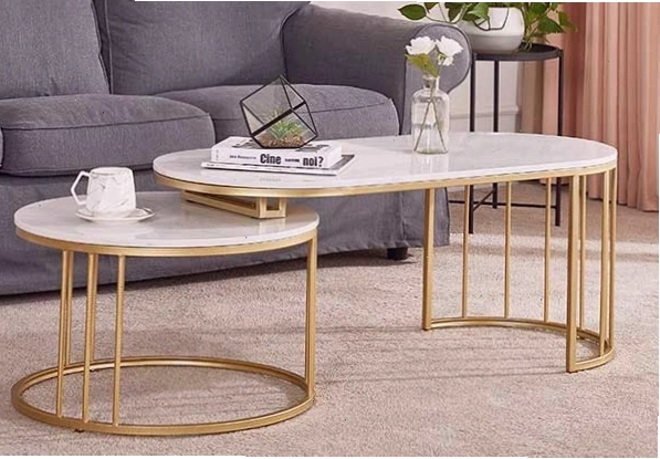 Bàn sofa mặt đá chân sắt màu đồng với kiểu dáng oval hiện đại