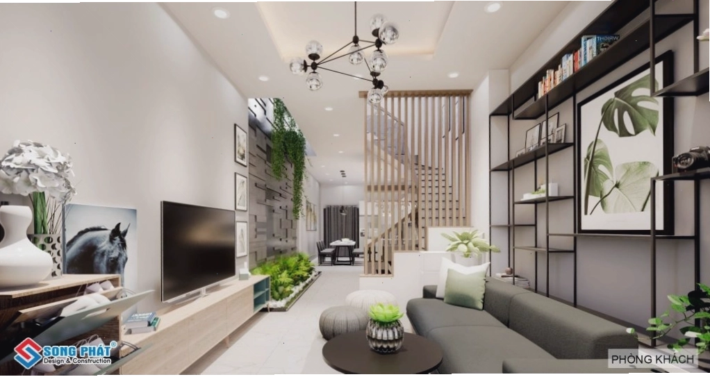 Giếng trời với tiểu cảnh kết hợp độc đáo với các vật phẩm trang trí bên trong phòng khách.