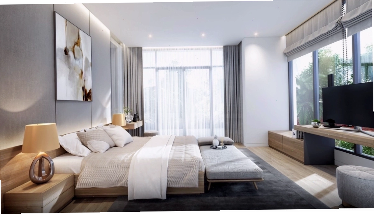 Không gian phòng ngủ biệt thự với thiết kế cửa kính hướng ra 2 mặt ngoài nhà