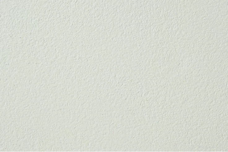 Texture tường trắng mịn, là phông nền lý tưởng cho các sự kiện hoặc trưng bày sản phẩm