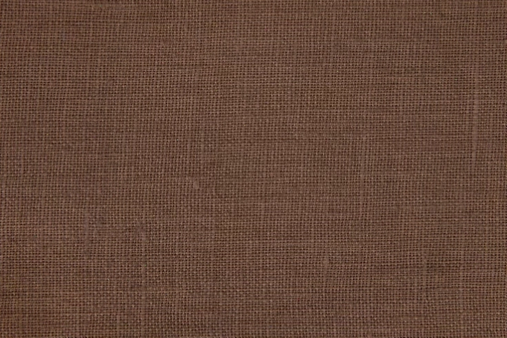 Texture vải màu nâu với bề mặt mịn, tạo cảm giác ấm áp và gần gũi