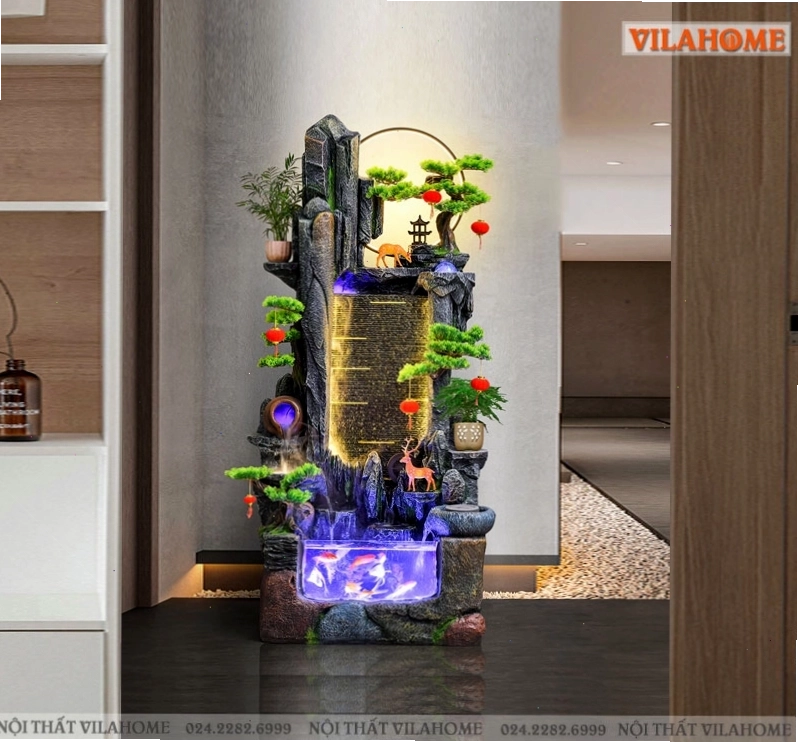 Tiểu cảnh thác nước với hòn non bộ, cây xanh và dòng nước chảy róc rách tạo không gian thư giãn